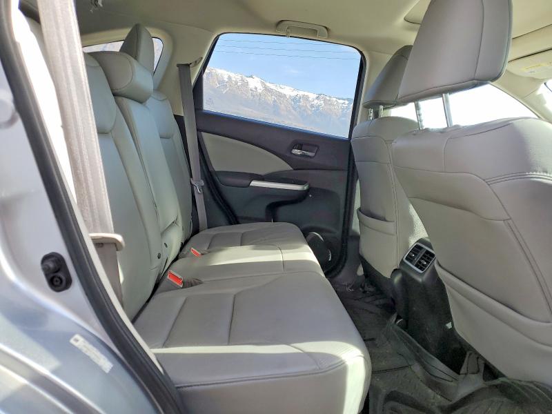 Photo 10 from auction – 2015 HONDA CR-V with VIN 2HKRM4H7XFH636411