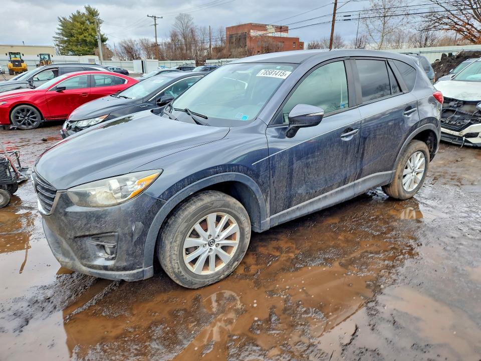 MAZDA CX-5 2016 with VIN JM3KE4CY3G0784596 - Photo from auction
