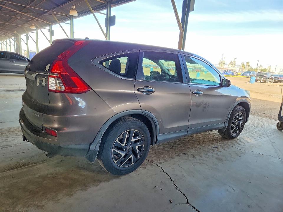 Photo 3 from auction – 2016 HONDA CR-V with VIN 2HKRM3H42GH521481
