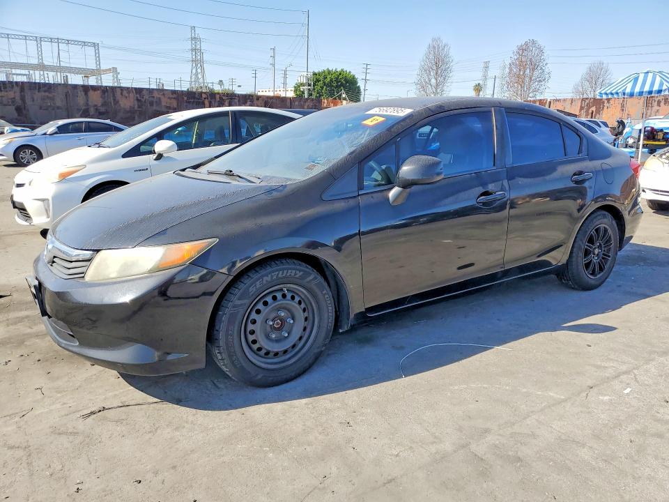 HONDA CIVIC LX 2012 with VIN 19XFB2F53CE391059 - Photo from auction