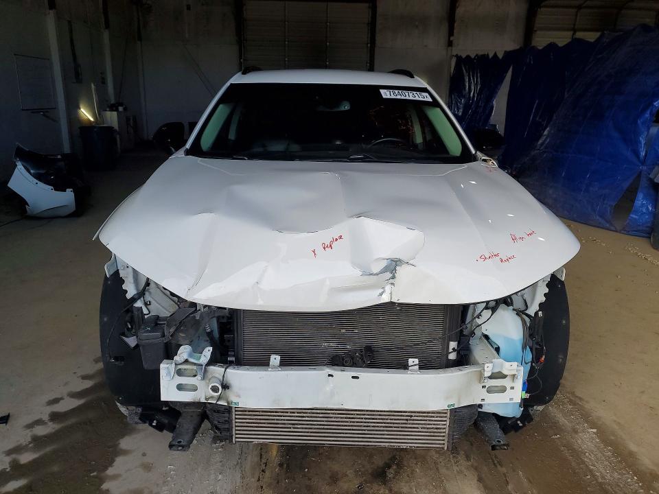Photo 5 from auction – 2021 BUICK ENVISION with VIN LRBFZNR49MD084481