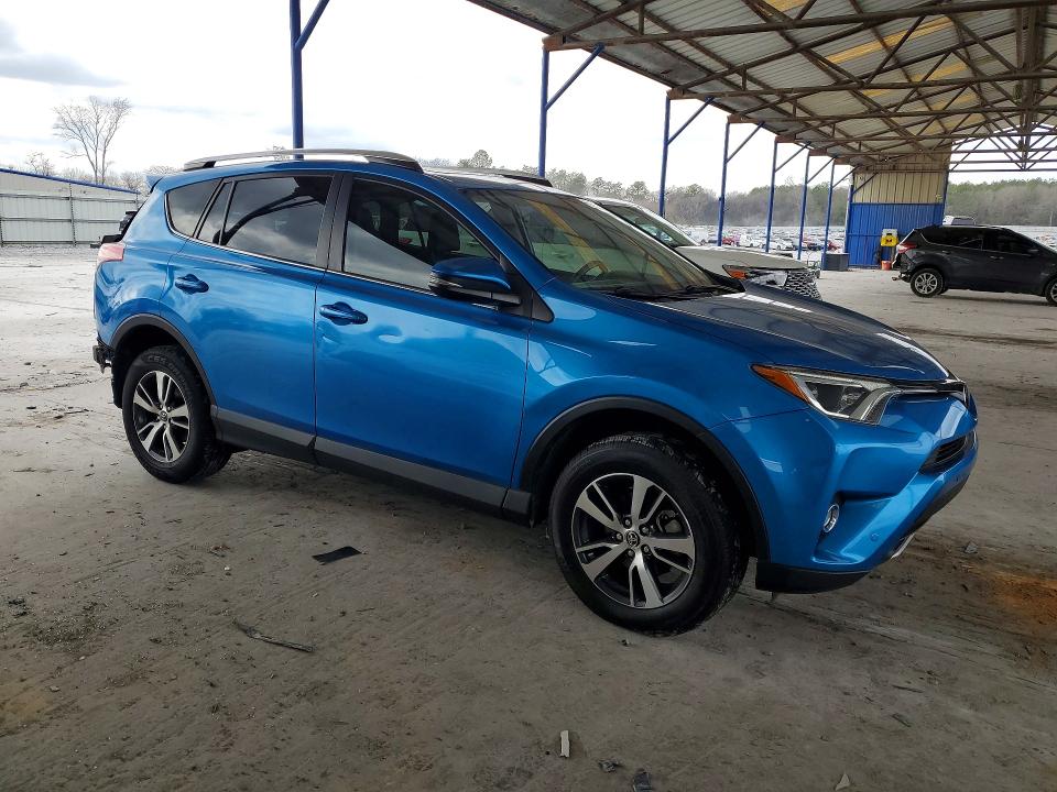 Photo 4 from auction – 2016 TOYOTA RAV4 with VIN JTMWFREV1GD089081