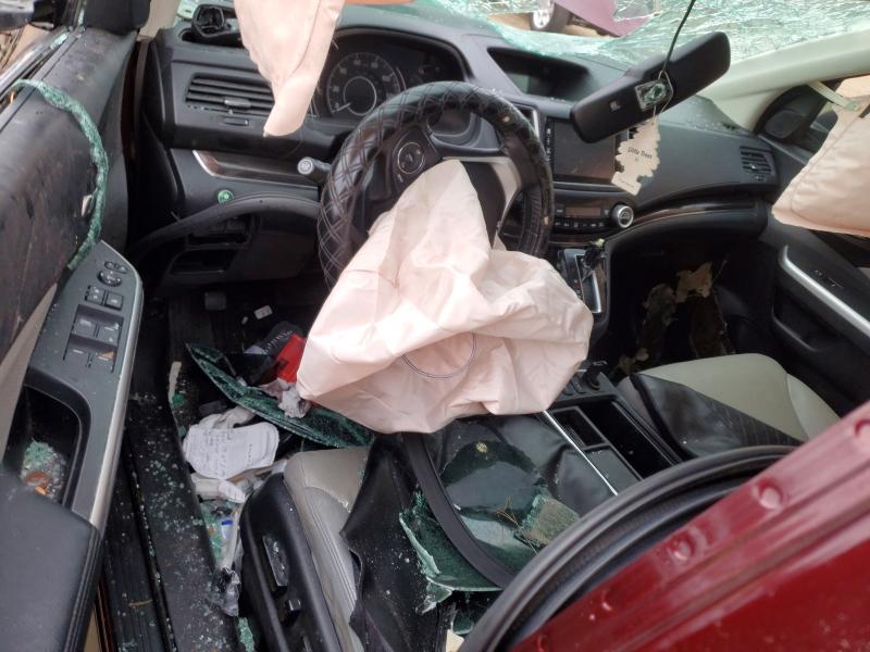 Photo 8 from auction – 2016 HONDA CR-V with VIN 2HKRM3H71GH558127