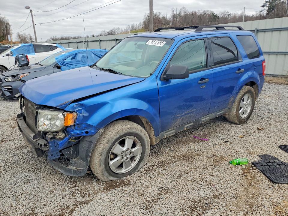 FORD ESCAPE 2011 with VIN 1FMCU0DG1BKB77474 - Photo from auction