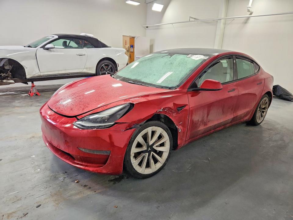 TESLA MODEL 3 2022 with VIN 5YJ3E1EA7NF285620 - Photo from auction
