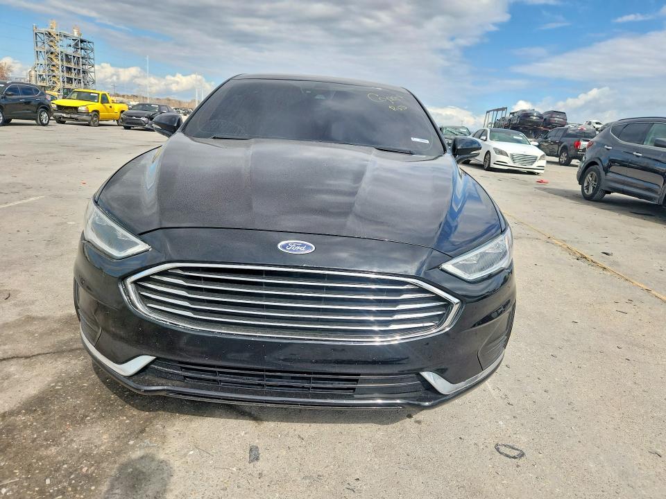Photo 5 from auction – 2019 FORD FUSION with VIN 3FA6P0CD0KR109359