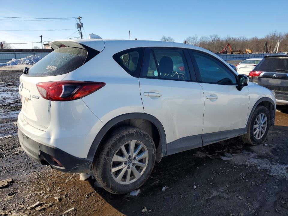 Photo 3 from auction – 2014 MAZDA CX-5 with VIN JM3KE2BE1E0425174