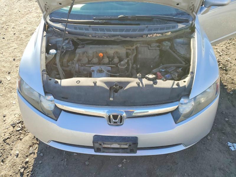 Photo 11 from auction – 2007 HONDA CIVIC LX with VIN 2HGFA16567H307311