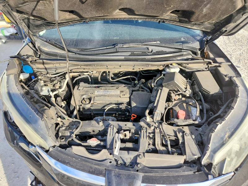 Photo 12 from auction – 2015 HONDA CR-V with VIN 3CZRM3H56FG709687
