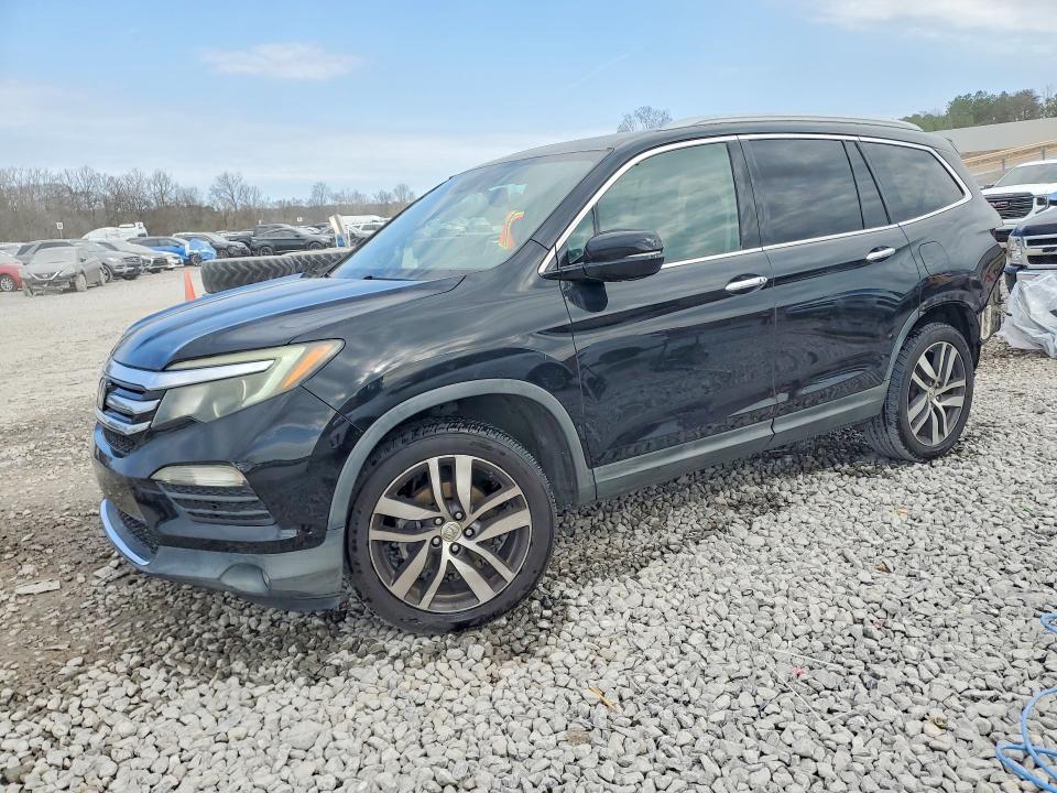 HONDA PILOT 2016 with VIN 5FNYF5H9XGB001136 - Photo from auction