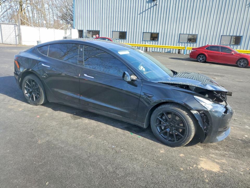 Photo 4 from auction – 2018 TESLA MODEL 3 with VIN 5YJ3E1EB9JF071912