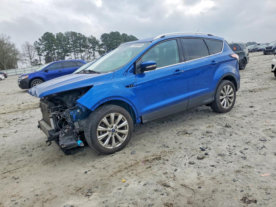 FORD ESCAPE TIT 2017 with VIN 1FMCU9J94HUC93582 - Photo from auction