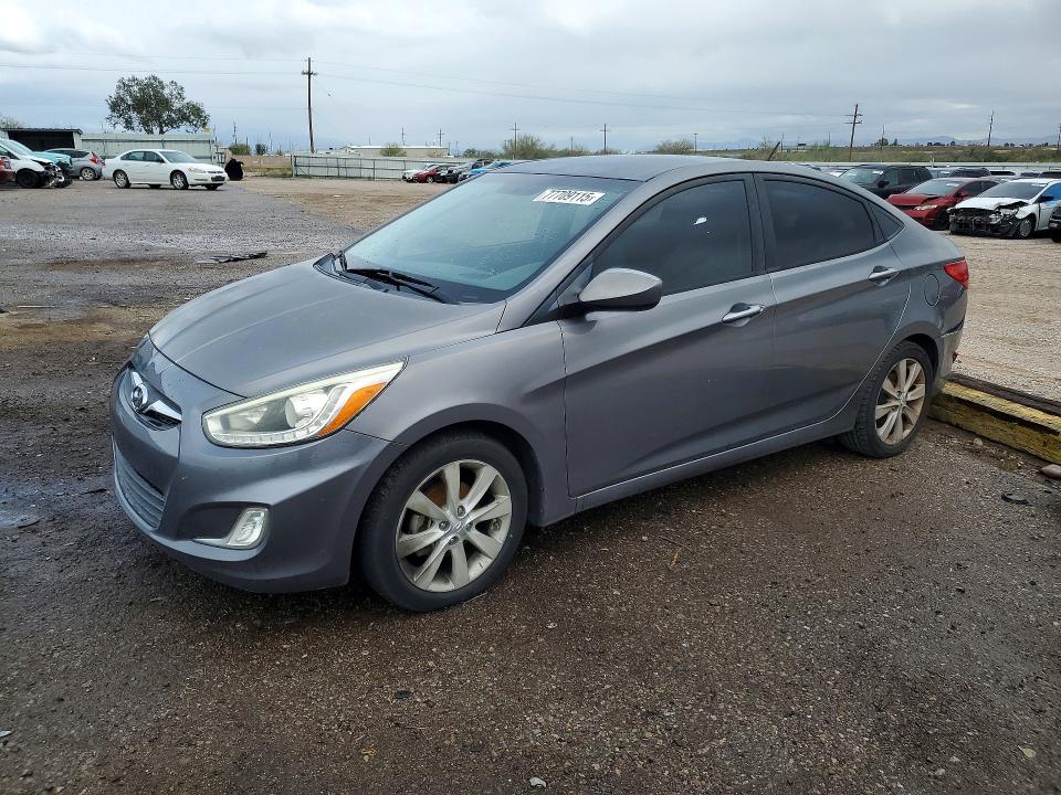 HYUNDAI ACCENT 2014 with VIN KMHCU4AE0EU719215 - Photo from auction