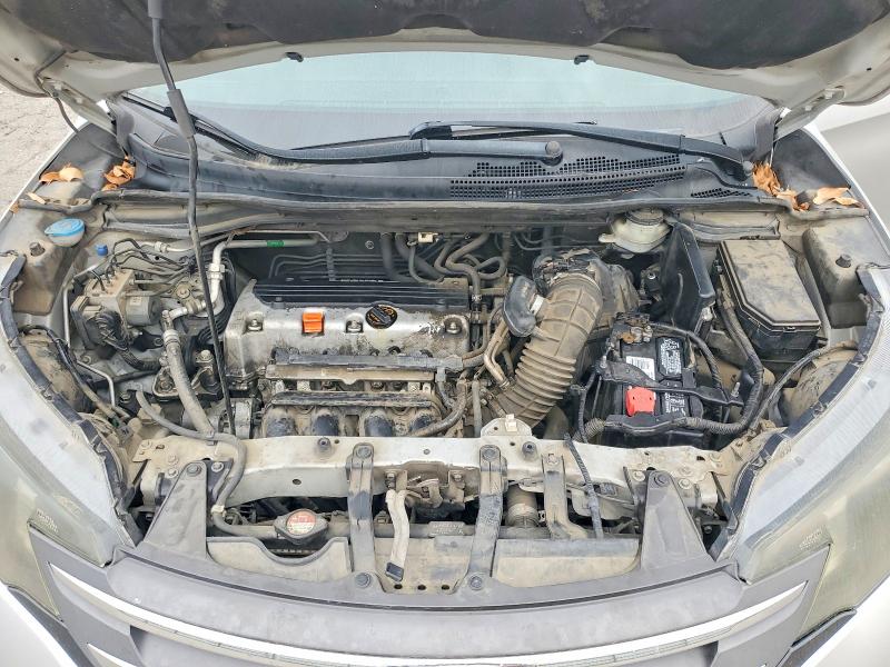 Photo 11 from auction – 2012 HONDA CR-V with VIN 2HKRM3H75CH512200