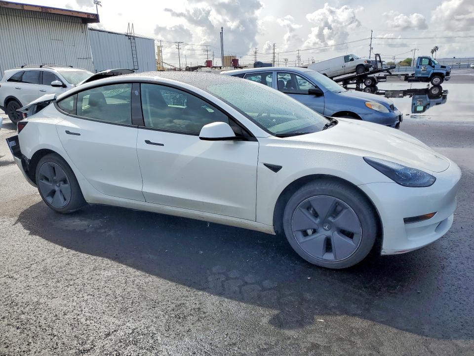 Photo 4 from auction – 2023 TESLA MODEL 3 with VIN 5YJ3E1EA8PF503065