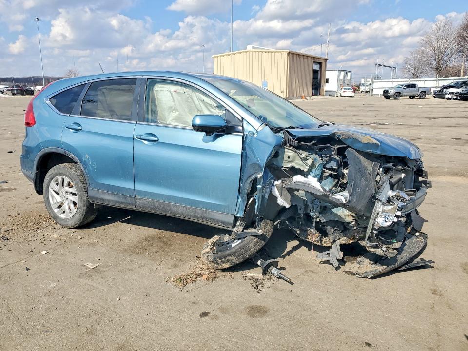 Photo 4 from auction – 2015 HONDA CR-V with VIN 2HKRM4H50FH666189