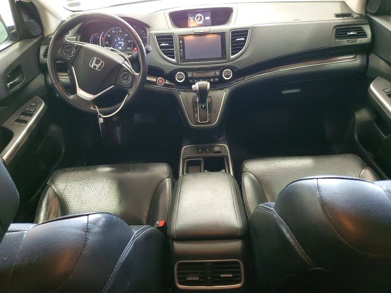 Photo 8 from auction – 2016 HONDA CR-V with VIN 2HKRM4H70GH709495
