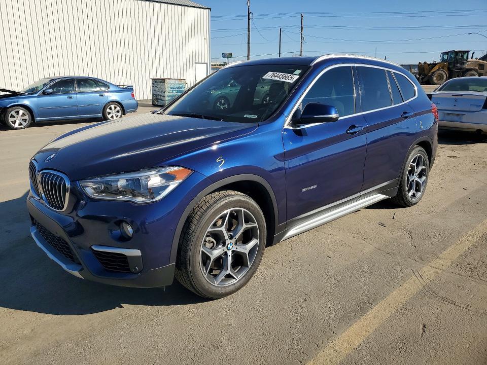 BMW X1 2016 with VIN WBXHT3C33G5E55591 - Photo from auction