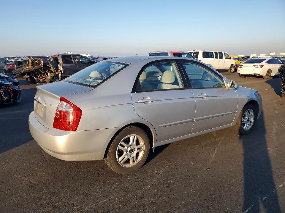 Photo 3 from auction – 2004 KIA SPECTRA LX with VIN KNAFE122445008611