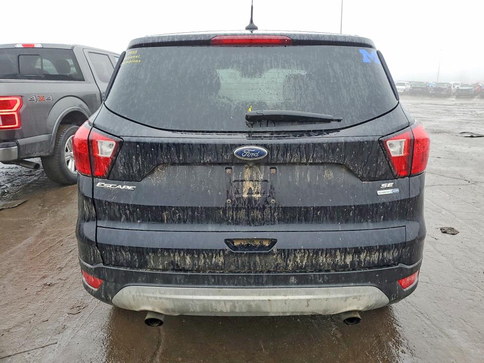 Photo 6 from auction – 2019 FORD ESCAPE with VIN 1FMCU9GD0KUB80344