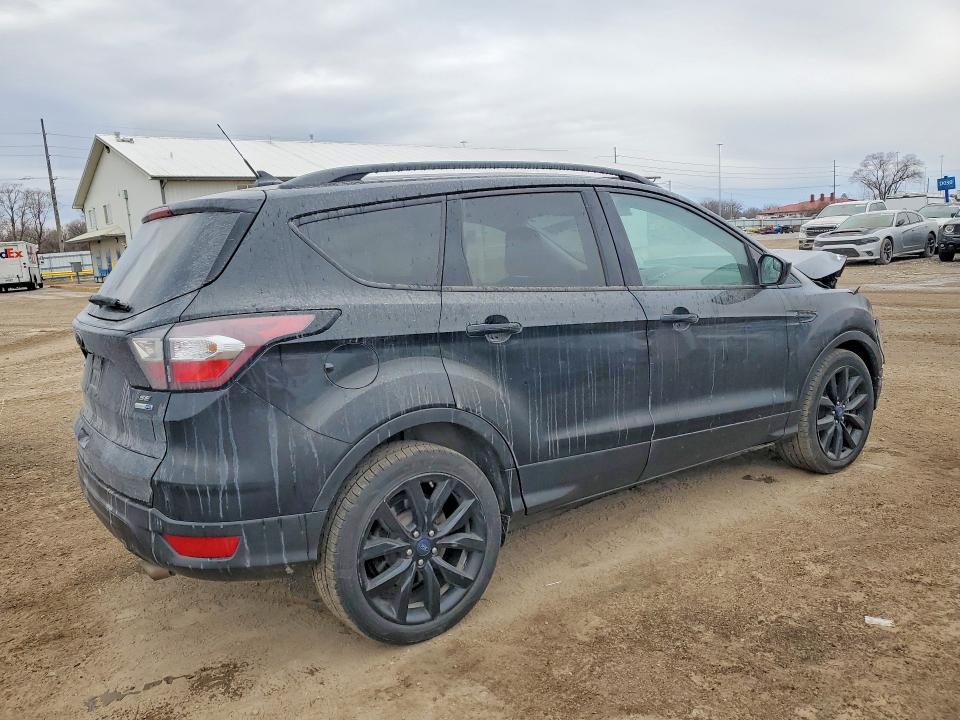 Photo 3 from auction – 2018 FORD ESCAPE with VIN 1FMCU9GD0JUC04527