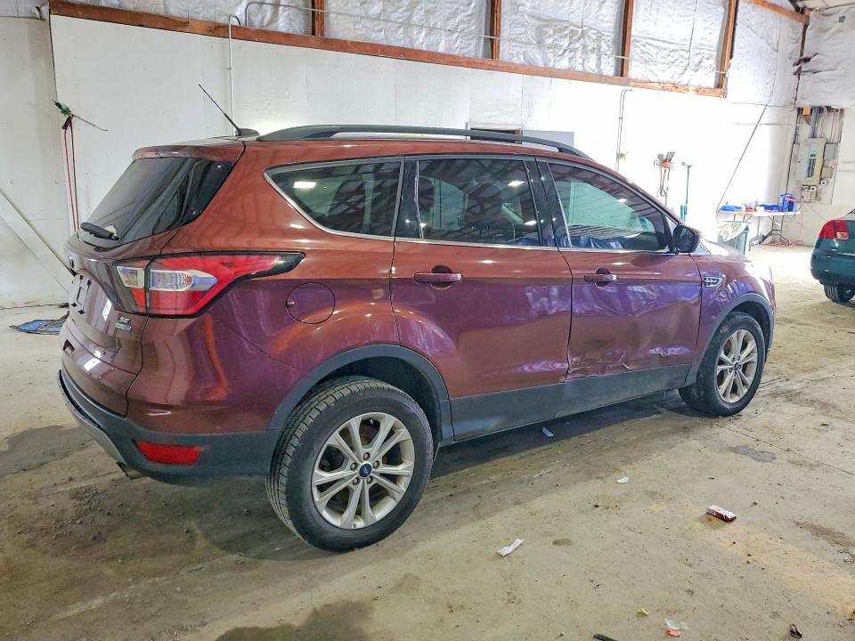 Photo 3 from auction – 2018 FORD ESCAPE with VIN 1FMCU9GD0JUC40914