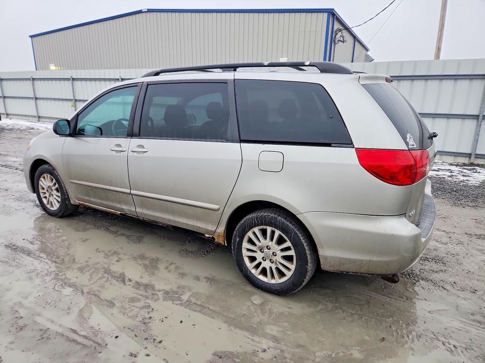 Photo 2 from auction – 2009 TOYOTA SIENNA LE with VIN 5TDBK23C79S023435
