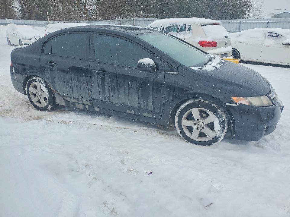 Photo 4 from auction – 2009 HONDA CIVIC DX-G with VIN 2HGFA16499H112667