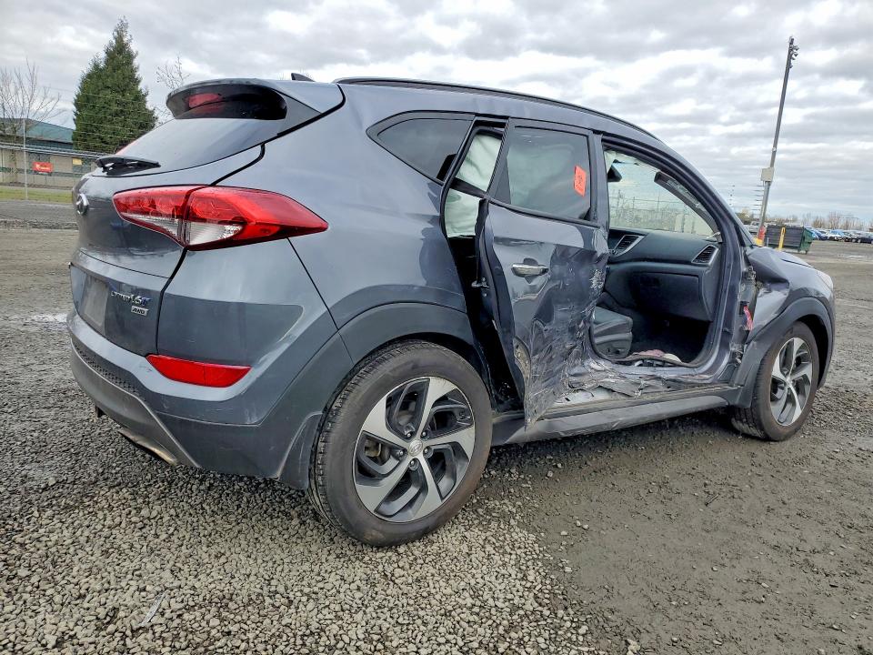 Photo 3 from auction – 2016 HYUNDAI TUCSON with VIN KM8J3CA2XGU191843