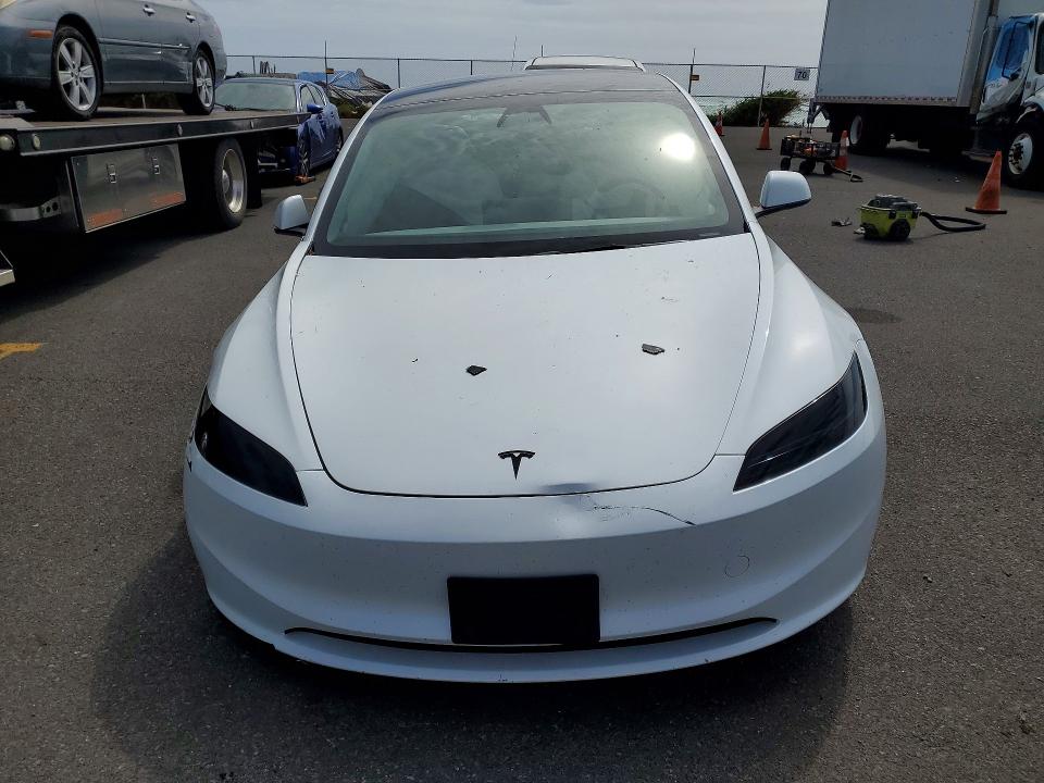 Photo 5 from auction – 2026 TESLA MODEL 3 with VIN 5YJ3E1EA9TF134792