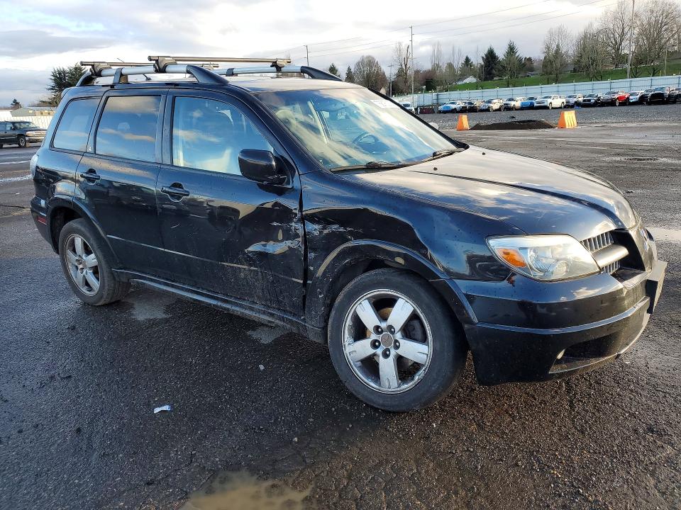 Photo 4 from auction – 2005 MITSUBISHI OUTLANDER with VIN JA4LZ81F35U047358