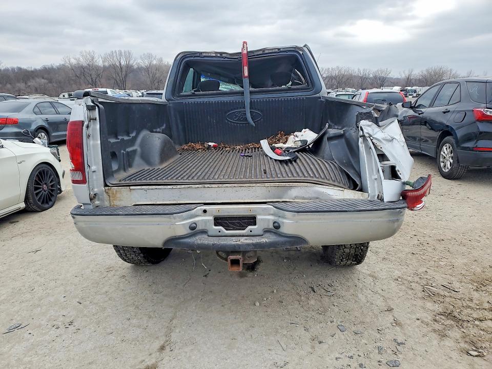 Photo 6 from auction – 2002 FORD F150 with VIN 1FTRX18L02NA61989