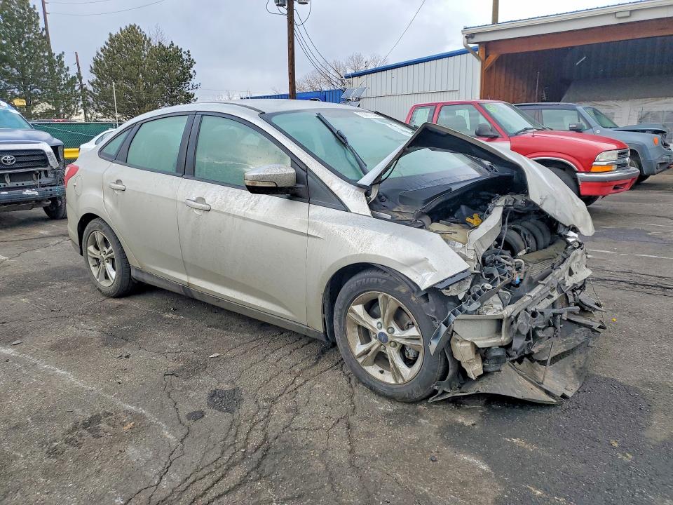 Photo 4 from auction – 2014 FORD FOCUS with VIN 1FADP3F23EL457257
