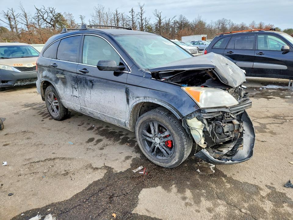 Photo 4 from auction – 2011 HONDA CR-V EXL with VIN JHLRE4H74BC005045
