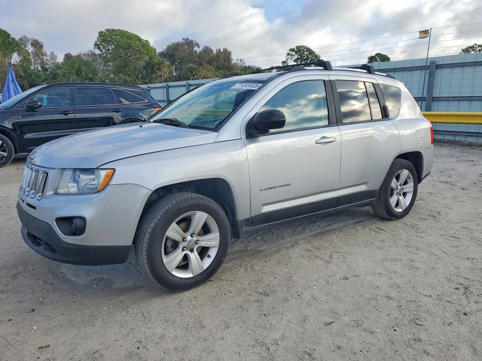 JEEP COMPASS 2011 with VIN 1J4NT1FA8BD259991 - Photo from auction