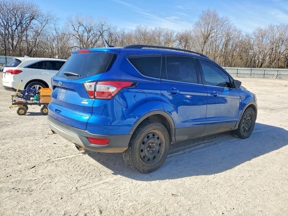 Photo 3 from auction – 2017 FORD ESCAPE with VIN 1FMCU0GD2HUC64752