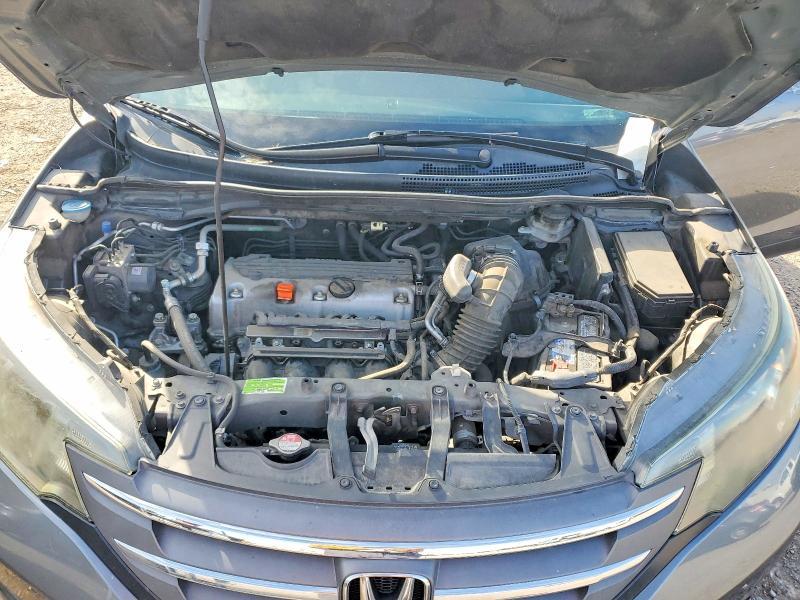 Photo 11 from auction – 2013 HONDA CR-V with VIN 2HKRM3H76DH518959
