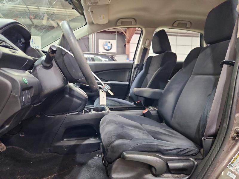 Photo 7 from auction – 2014 HONDA CR-V with VIN 5J6RM4H39EL013444