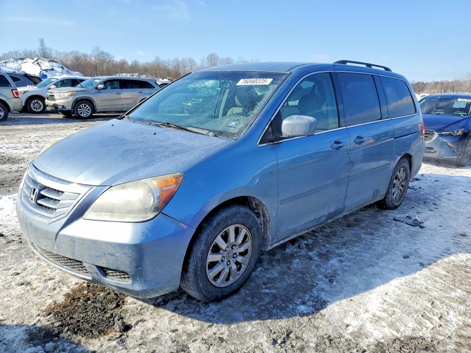 HONDA ODYSSEY EX 2010 with VIN 5FNRL3H59AB018452 - Photo from auction