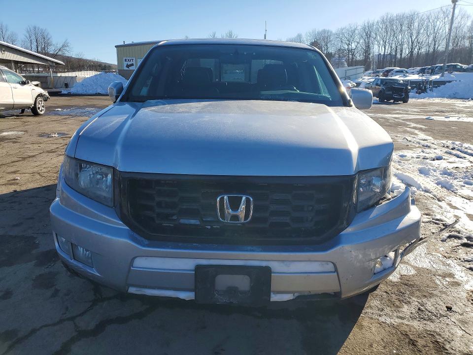 Photo 5 from auction – 2014 HONDA RIDGELINE with VIN 5FPYK1F68EB012976