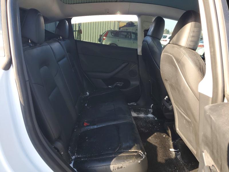 Photo 11 from auction – 2023 TESLA MODEL Y with VIN LRWYGDEE0PC027277