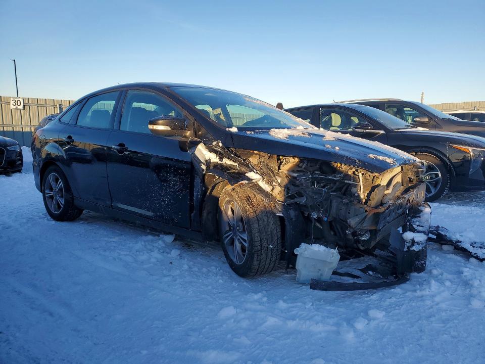 Photo 4 from auction – 2018 FORD FOCUS with VIN 1FADP3FE0JL306302