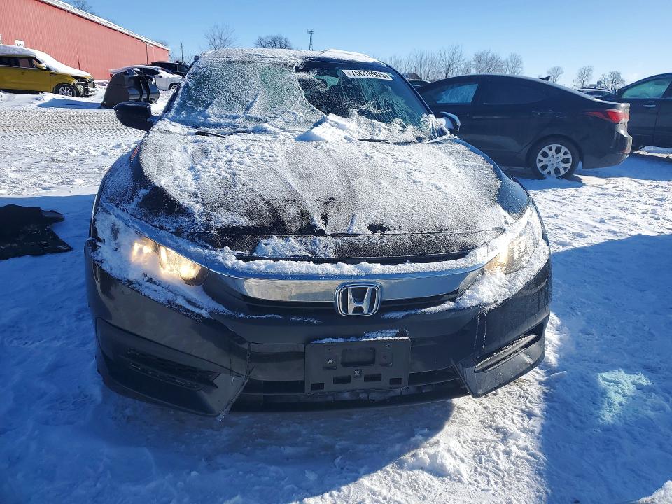 Photo 5 from auction – 2018 HONDA CIVIC LX with VIN 2HGFC2F50JH000658