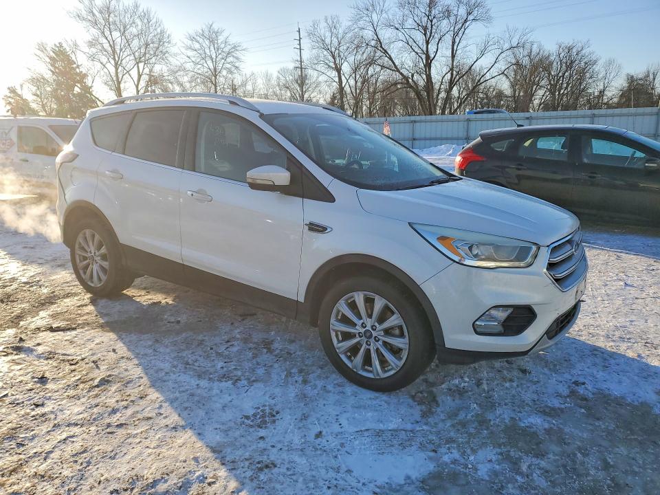 Photo 4 from auction – 2017 FORD ESCAPE with VIN 1FMCU9JD8HUD82849
