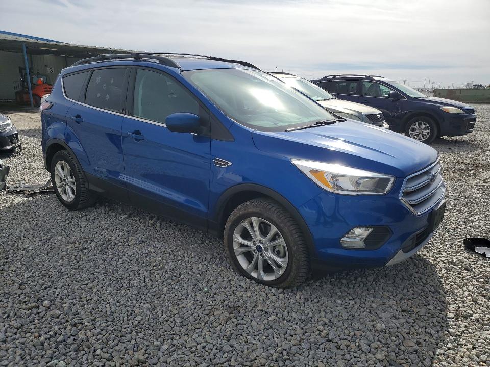 Photo 4 from auction – 2018 FORD ESCAPE with VIN 1FMCU9GD3JUA23180