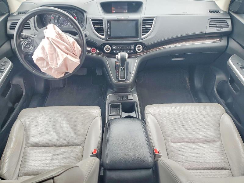 Photo 8 from auction – 2015 HONDA CR-V with VIN 2HKRM3H79FH538898