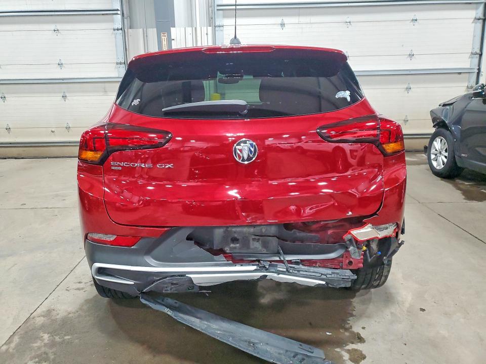 Photo 6 from auction – 2021 BUICK ENCORE GX with VIN KL4MMCSL8MB140414