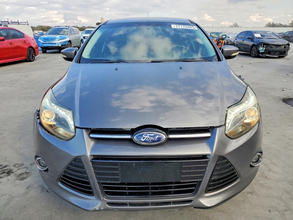 Photo 5 from auction – 2014 FORD FOCUS TITA with VIN 1FADP3N29EL180325