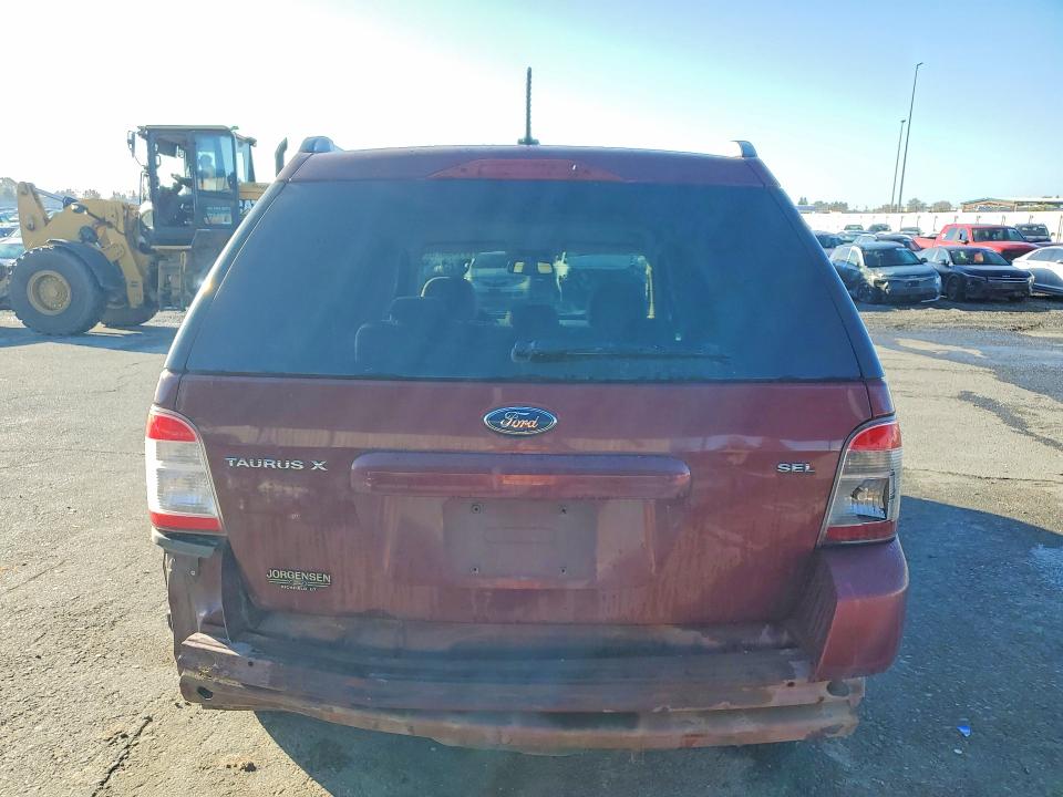 Photo 6 from auction – 2008 FORD TAURUS X with VIN 1FMDK02W68GA12164