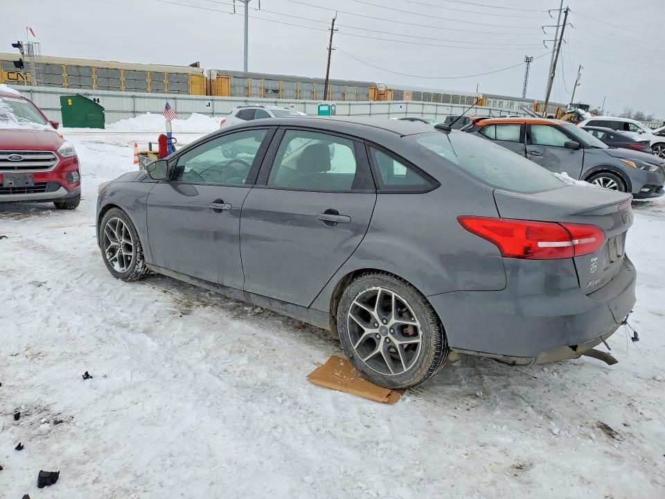 Photo 2 from auction – 2018 FORD FOCUS with VIN 1FADP3H21JL258117
